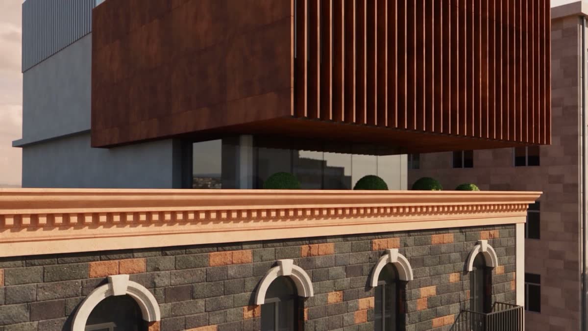 The corten volume floating above the restored cornice of the tuff facade.